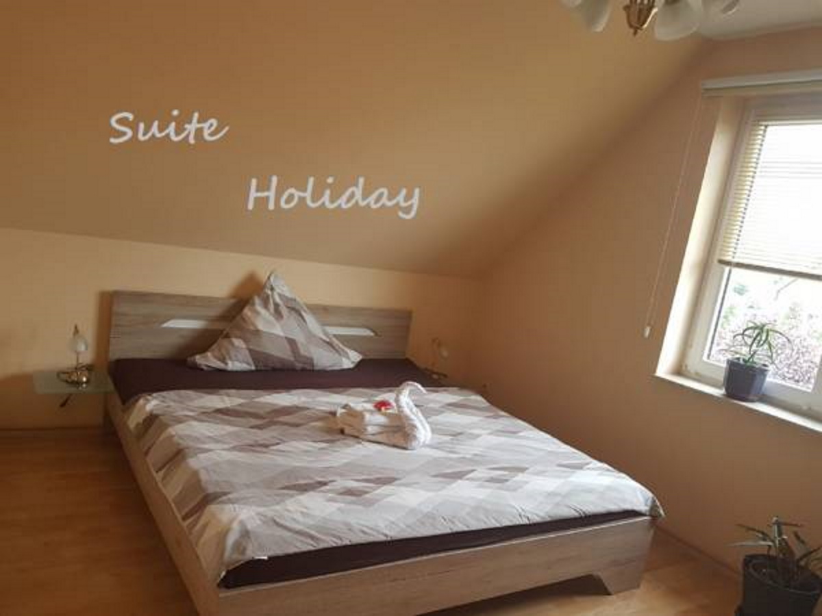 Ostsee Urlaub Ferienwohnung Suite Holiday im Blick in das Schlafzimmer